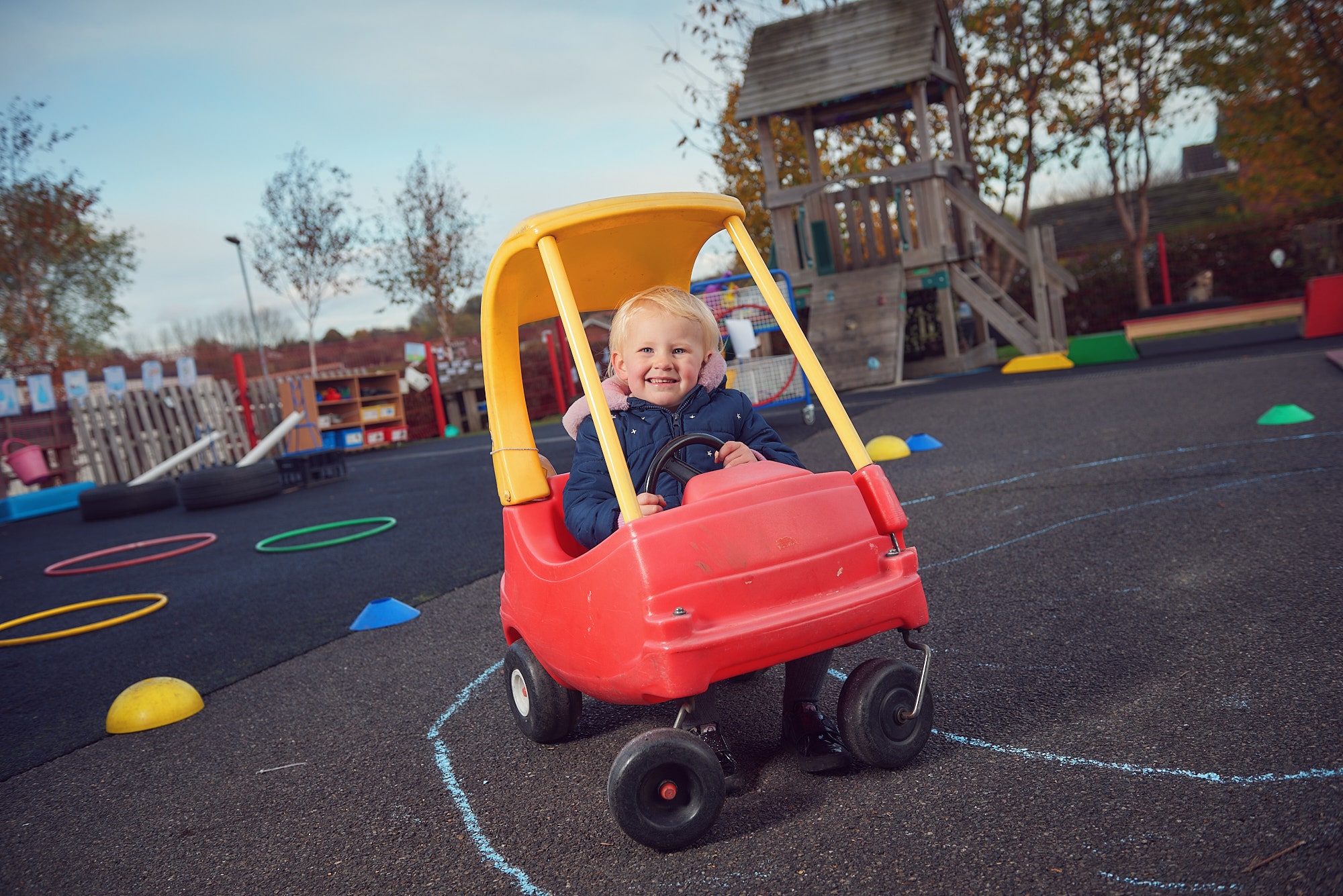 Towngate pupil in a toy car